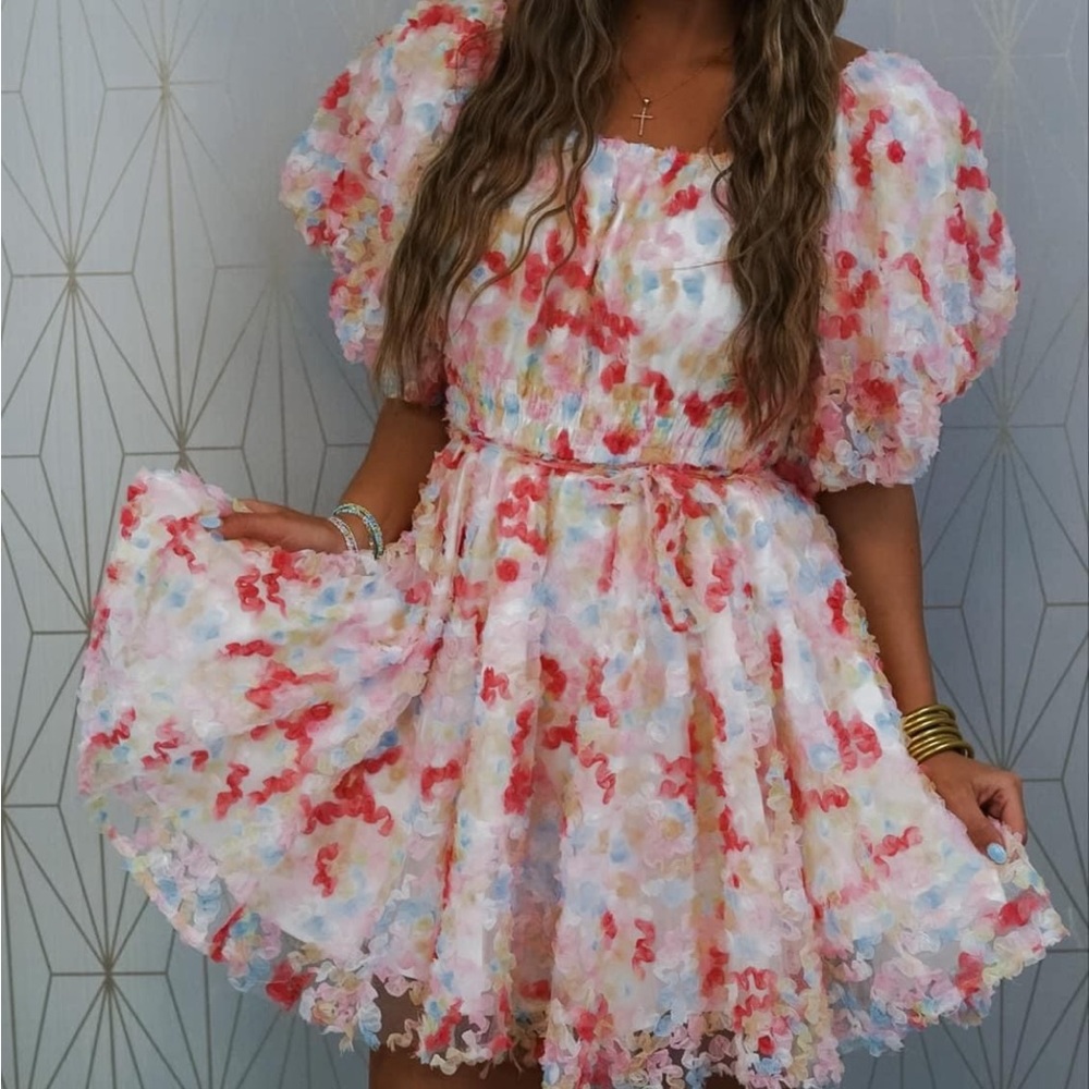 You give me butterflies dress. Never worn still has tags